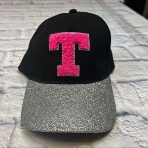 Justice glitter hat with the letter "T"
